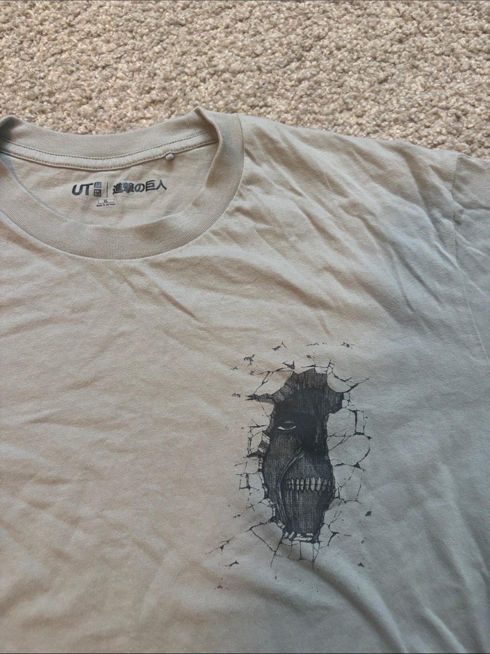 Uniqlo Men’s Short-Sleeve Graphic Tee in Light Beige with Black Print